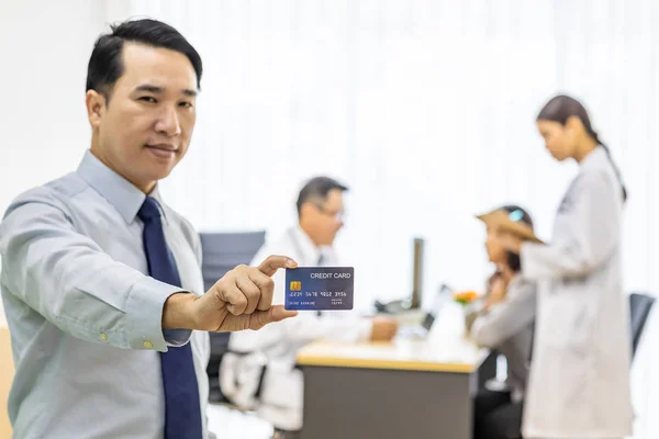 Portrait Young Adult Patient Credit Card Examination Room Medical Office — Stock Photo, Image