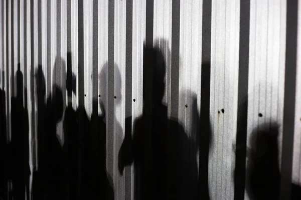 People Shadow Zinc Wall Background — Stock Photo, Image
