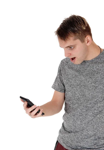 Beau Jeune Homme Debout Dans Pull Gris Regardant Son Téléphone — Photo