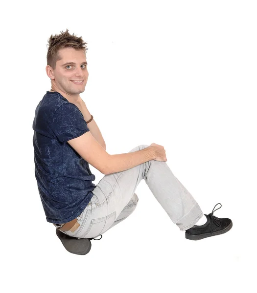 Young Very Happy Man Light Gray Jeans Sitting Floor Smiling — Stock Photo, Image