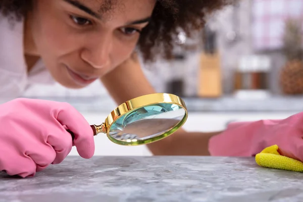 Portrait Young Woman Wearing Pink Gloves Looking Kitchen Counter Magnifying — Stock Photo, Image
