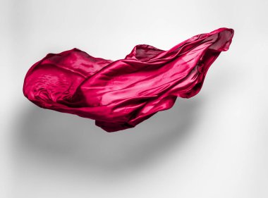 abstract piece of red fabric flying, high-speed studio shot clipart