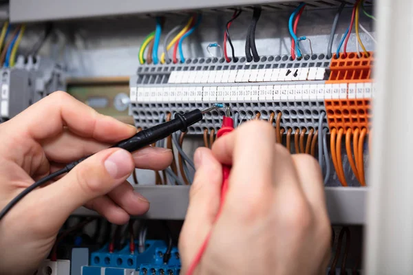 Close Male Electrician Examining Fuse Box Multimeter — Stock Photo, Image