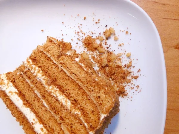 Top View Traditional Honey Cake Slice Crumbs White Plate — Stock Photo, Image