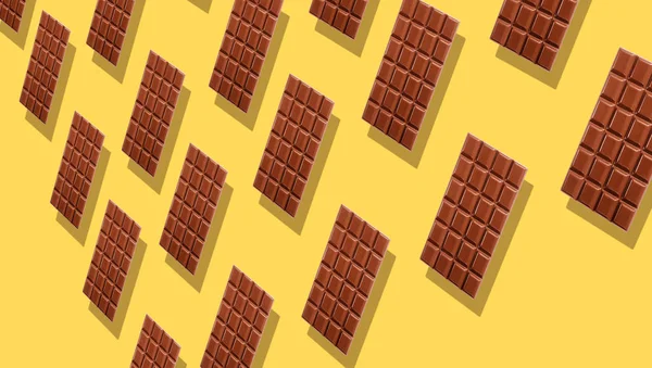 Milchschokolade Tabletten Vervielfältigung Auf Gelbem Hintergrund Mit Schatten Der Perspektive — Stockfoto