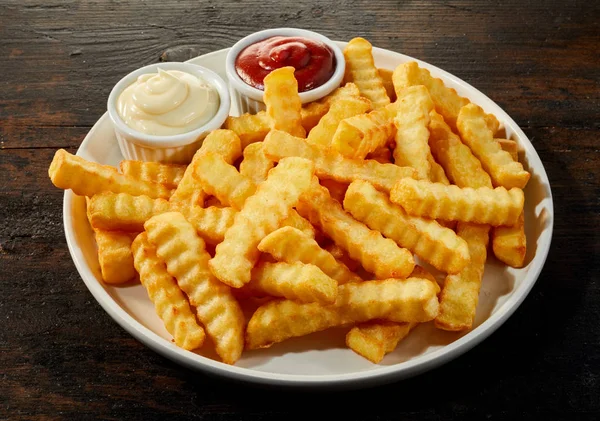 Plate Crinkle Cut Crisp Golden French Fries Mustard Mayonnaise Ketchup — Stock Photo, Image