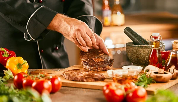 Chef Seasoning Raw Steak Grilling Surrounded Fresh Ingredients Vegetables Close — Stock Photo, Image