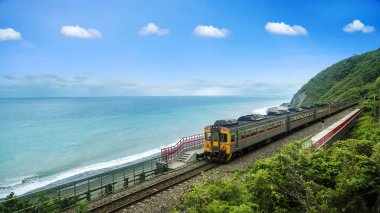 The The train station beside the beach on the east of Taiwan clipart
