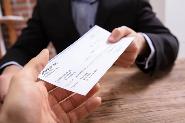 Close Businessman Hands Giving Cheque Other Person Office — Stock Photo, Image