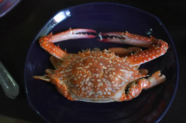 Stir-Fried Sea Crab with Curry Powder Sauce, coconut milk and Eggs or Curried crab, Thai cuisine