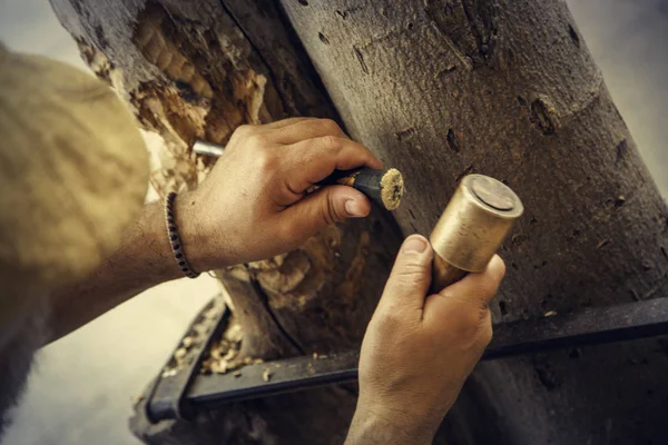 Carving wood, art detail in wood