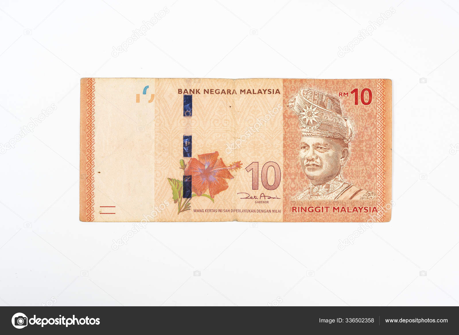 白色表面上的10马来西亚林吉特钞票—— 库存社论照片© PantherMediaSeller #336502358
