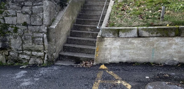 Cement stairs and stone retaining wall