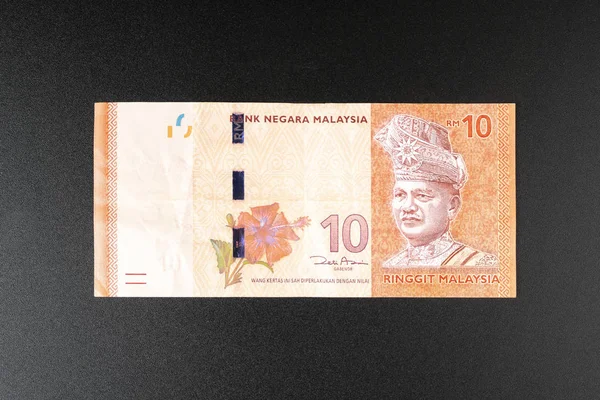 Малайзійських Банкнот Чорній Поверхні — стокове фото