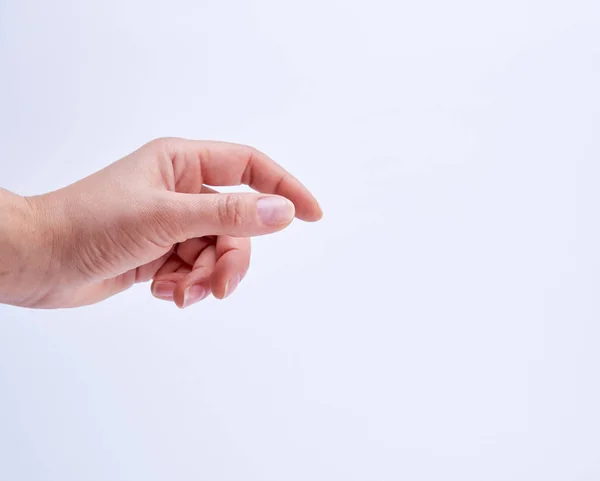 Mano Femenina Mostrando Gesto Sostener Objeto Sobre Fondo Blanco —  Fotos de Stock