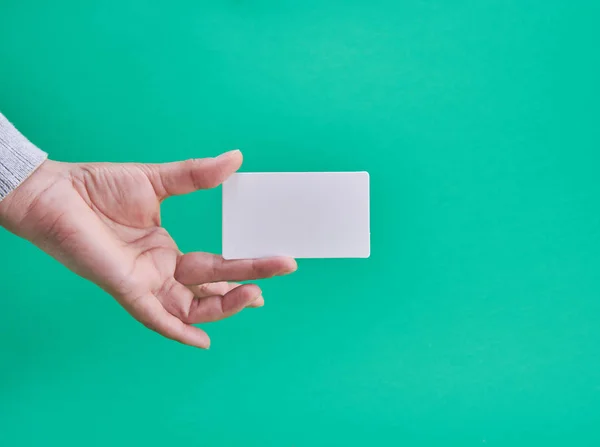 White Paper Business Card Female Hand Green Background — Stock Photo, Image