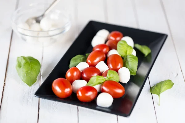 Fresh Mozzarella Cheese Balls Cherry Tomatoes Green Basil Isolated White — Stock Photo, Image