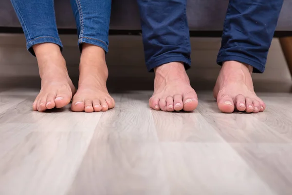 Low Section Couple Feet Floor Living Room — Stock Photo, Image