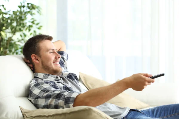 Side View Portrait Happy Man Relaxing Watching Sitting Couch Living — Stock Photo, Image