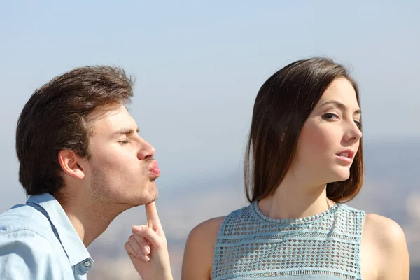 Woman Rejecting Friend Kiss Sunny Day — Stock Photo, Image