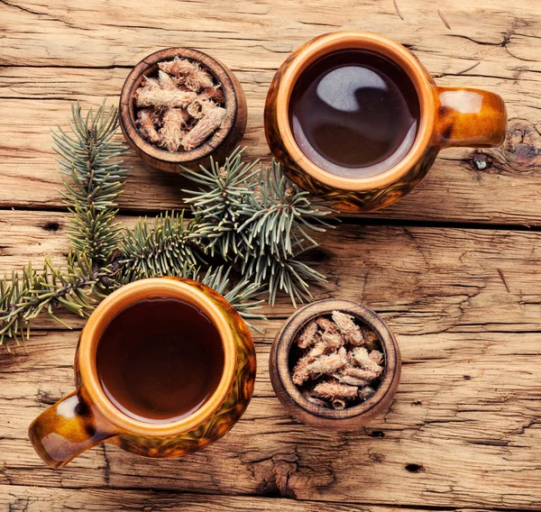 Cup Örtte Med Pinjenötter Trä Bakgrund — Stockfoto