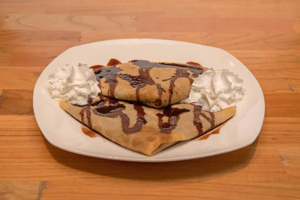 Two Pancakes Crepes With Chocolate Cream Dessert