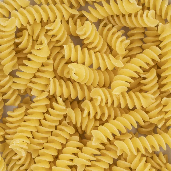 Arka Plan Olarak Kurutulmuş Fusilli Makarna — Stok fotoğraf