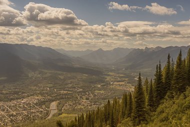 View of the city of Fernie looking down from a mountain. clipart