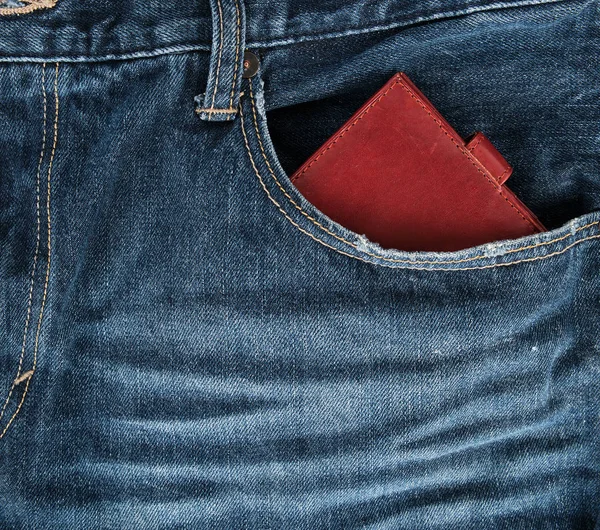 Brązowy Skórzany Portfel Przedniej Kieszeni Niebieskich Dżinsów Pełna Ramka — Zdjęcie stockowe