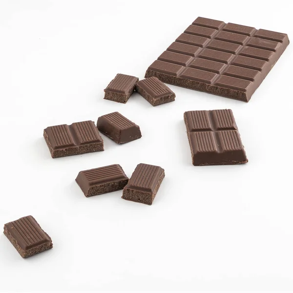 Chocolate Bar Chopped White Surface — Stock Photo, Image