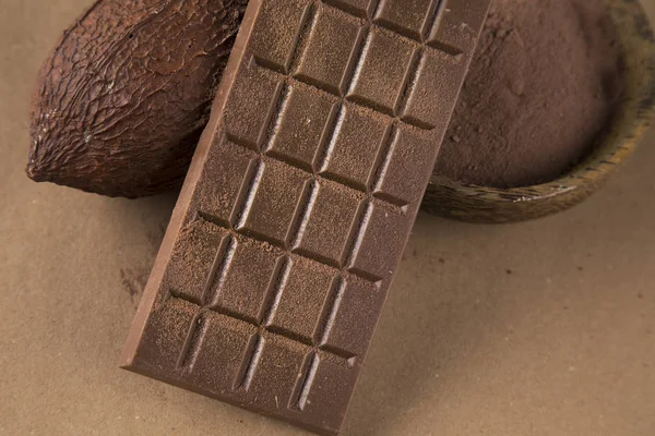 Leche Chocolate Negro Sobre Fondo Papel Natural — Foto de Stock