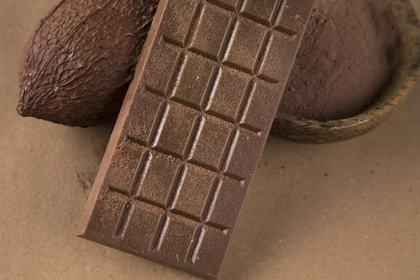 Melk Pure Chocolade Een Natuurlijke Papieren Ondergrond — Stockfoto