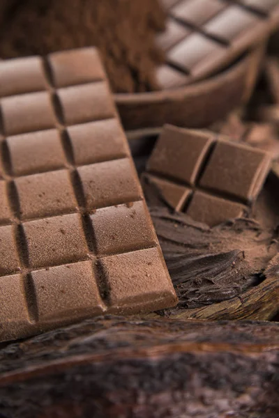 Leche Chocolate Negro Sobre Fondo Papel Natural — Foto de Stock