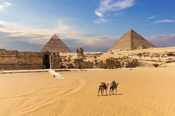 The Great Pyramids, the Sphinx and the temple entrance in Giza, Egypt.