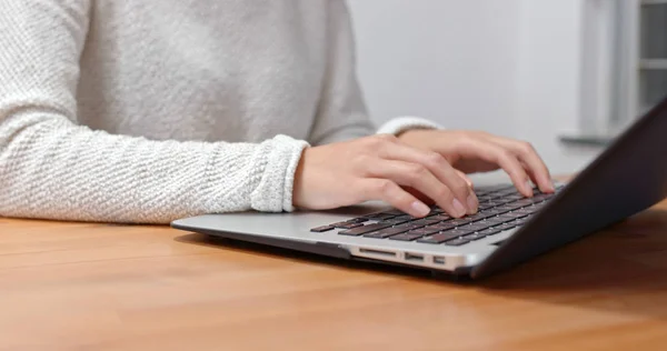 Woman type on computer