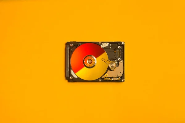 Colorful hdd. open hard disk drive. The concept of data storage. data array. hard drive from the computer. hdd with mirror effect. copy space