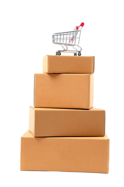 Red Shopping Cart Brown Parcels Box — Stock Photo, Image