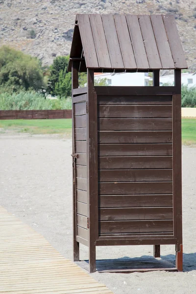 Wooden public change rooms on the beach. Colorful change rooms. Holiday concept.