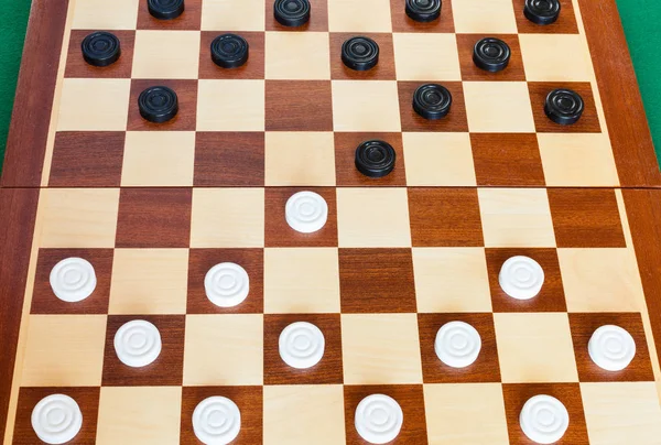 Wooden Checkered Board Draughts Green Baize Table — Stock Photo, Image