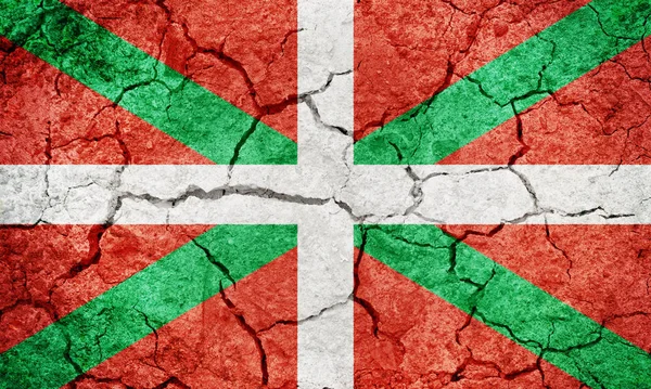 巴斯克自治区旗 西班牙北部自治区 在干燥的地面纹理背景 — 图库照片