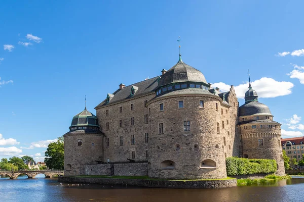 Orebro Castle. The medieval castle fortification in Orebro, Narke, Sweden. Orebro Castle at sunny summer day. Tourism holidays and travel. Tourist attractions in Sweden.