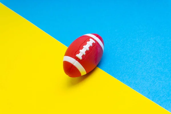 Rugby Ball Blue Yellow Background Selective Focus — Stock Photo, Image