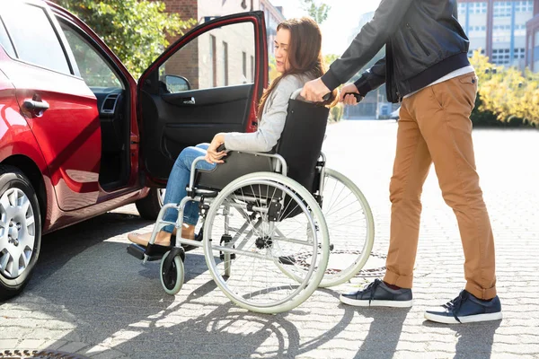 Close Man Her Wife Sitting Wheelchair Moving Car — Stock Photo, Image