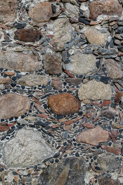 The texture of the old stone wall, the foundation of the old building