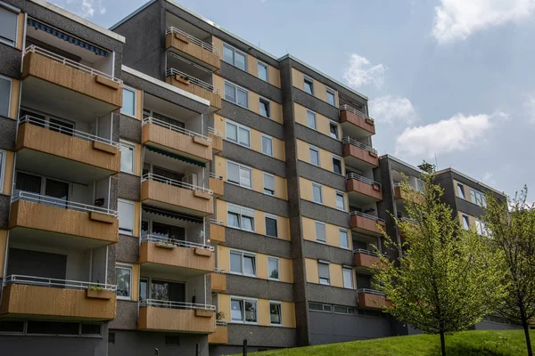 colored houses in the city with balconies