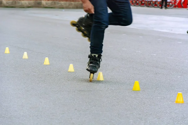 Feet Skater While Performing Slalom Yellow Plastic Cones Placed Line — Stock Photo, Image