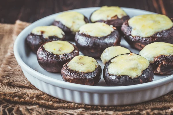 Baked mushrooms stuffed with mozzarella