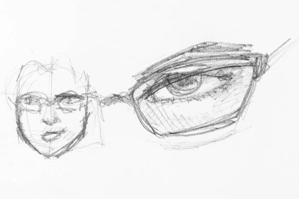 男性头部和眼睛的草图下眼镜手绘用黑色铅笔在白纸上 — 图库照片