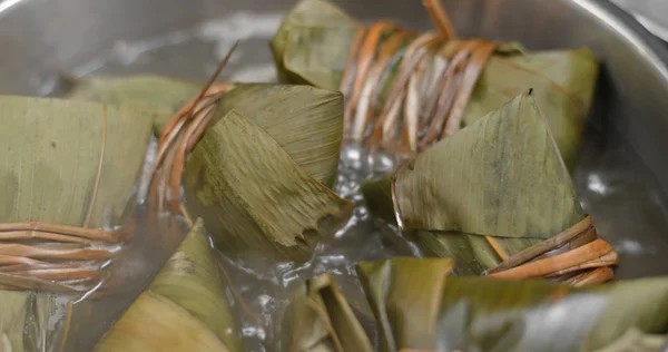 Cook with bamboo sticky rice dumpling