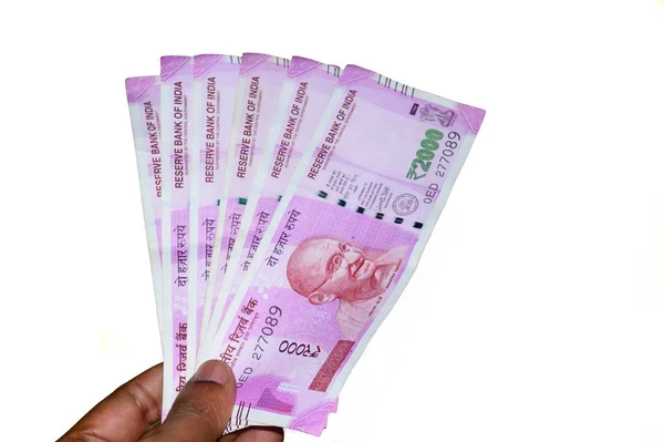 Selective Focus Hand Holding Indian 2000 Rupee Notes White Background — стокове фото